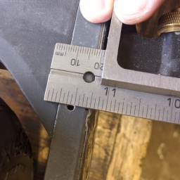 Transfering the hole position to the side of the rail.