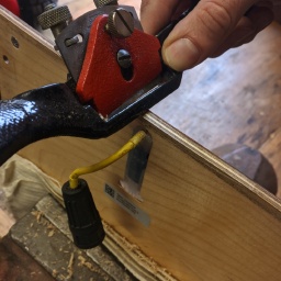 Using a spokeshave to remove the material, a power grinder or a rasp will do the job as well.